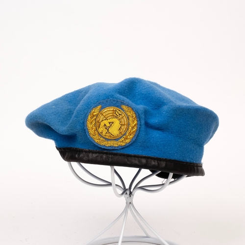 65 - Nine Peaked Caps and Berets, includes RAF, WAAF, Royal Marines