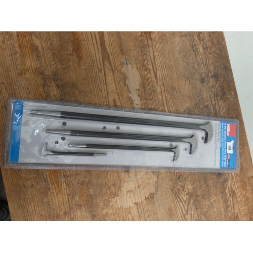 30 - A four piece heavy duty pry bar set