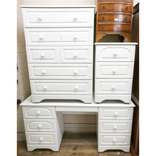 281 - A white kneehole dressing table fitted seven drawers, a matching tallboy chest and a matching bedsid... 