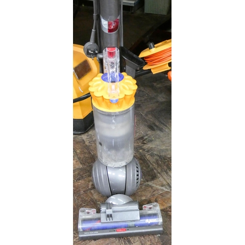 110 - A yellow and silver Dyson ball upright vacuum cleaner