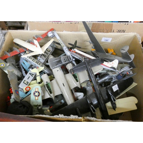 142 - A large box of played with model airplanes (some damaged)