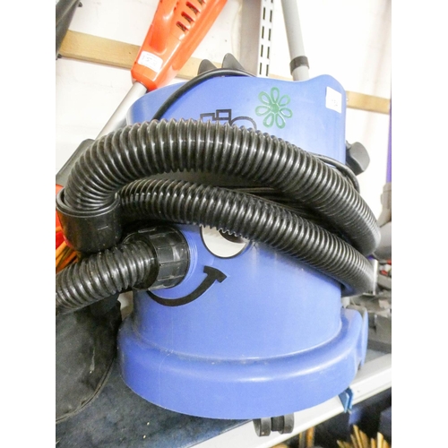 154 - A blue numatic Henry style vacuum cleaner with tools