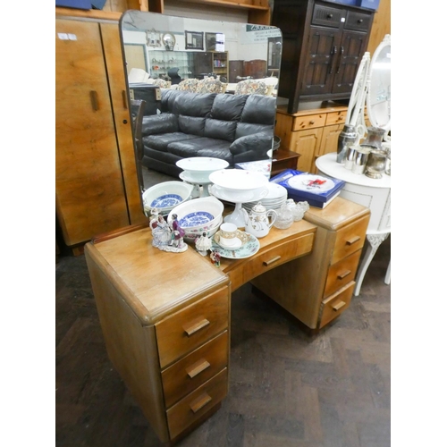 407 - A 1940's gent's walnut two door wardrobe 2'9 wide and a matching kneehole dressing table