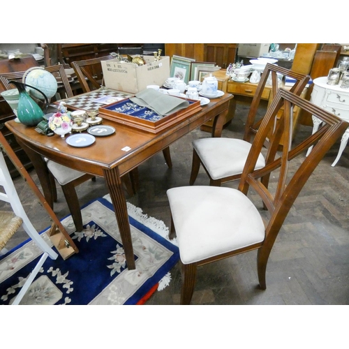 367 - Mahogany dining table on reeded legs and four matching high backed chairs with upholstered seats