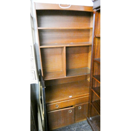 457 - !970's teak open bookshelves standing on a drawer and cupboard base 3' wide