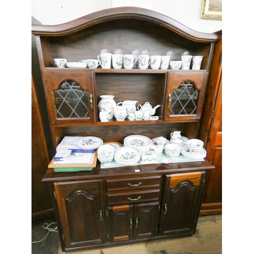 468 - A walnut dresser or bookcase with shelf and glazed back, drawers and cupboards under, 4'6 wide