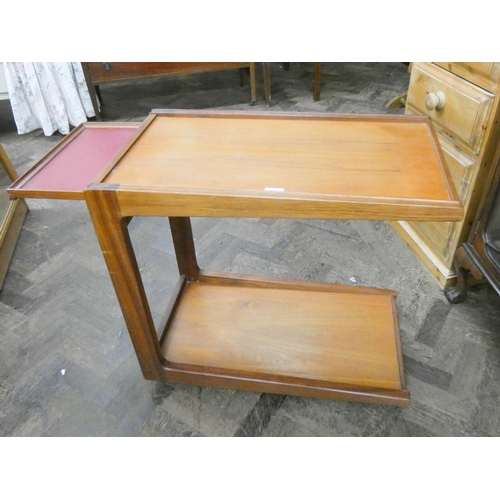 481 - A 1970's teak two tier tea trolley with pull out slide