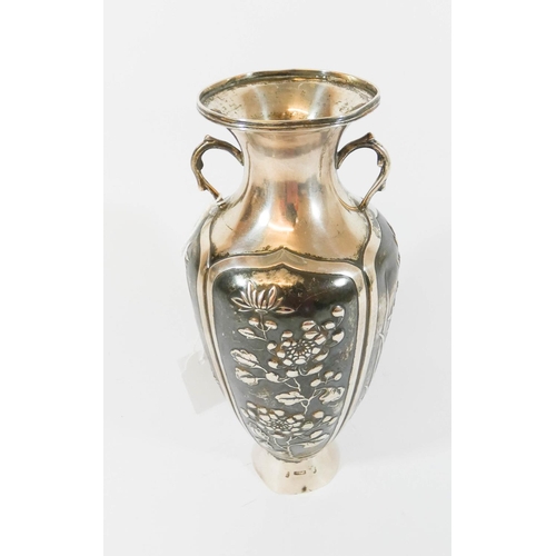 603 - Chinese export silver twin handled vase, marked Zeewo Shanghai, 18 cms tall. Gross weight 9 troy oun... 