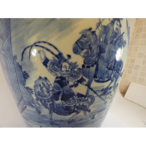 505 - A 19th century Chinese blue and white vase and cover decorated with figures on horseback, the lid wi... 