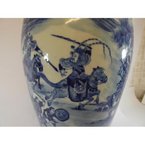 505 - A 19th century Chinese blue and white vase and cover decorated with figures on horseback, the lid wi... 