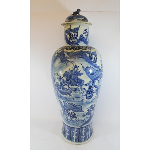 505 - A 19th century Chinese blue and white vase and cover decorated with figures on horseback, the lid wi... 