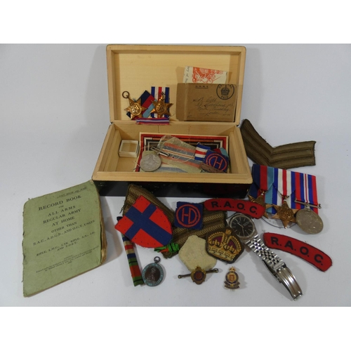 512 - World War II group of medals, insignia, old citizen quartz watch, army record book etc