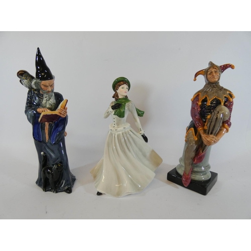 548 - Royal Doulton figurines 'The Wizard' and 'The Jester'  together with a Coalport lady of fashion 'Win... 