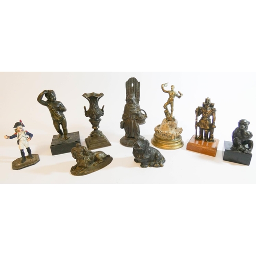 558 - A collection of antique bronze and spelter small sculptures to include match striker, cherubs, soldi... 