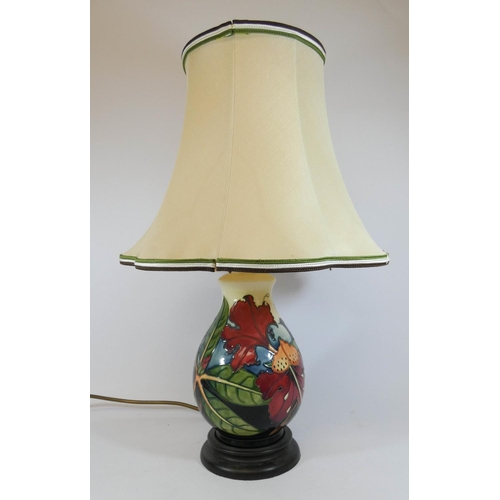 486 - A Moorcroft Hibiscus table lamp with shade