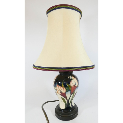 488 - A small baluster shaped Moorcroft table lamp with shade