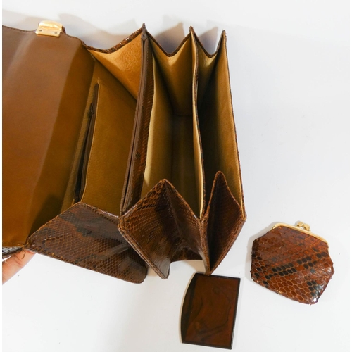 573 - A vintage ladies snakeskin handbag