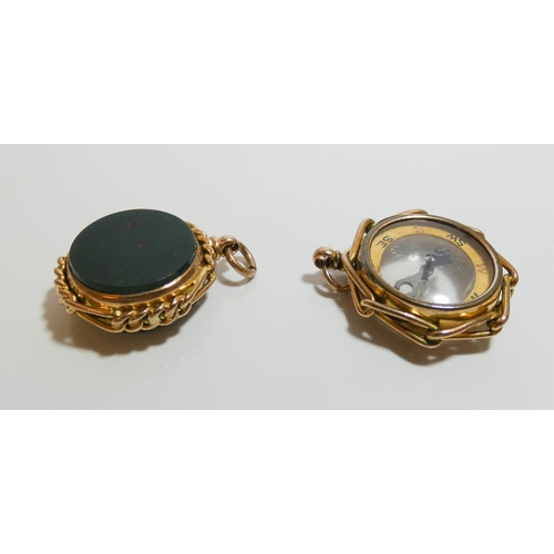 621 - 9ct gold fob set blood stone to one side and compass to other and another hallmarked 9ct gold compas... 