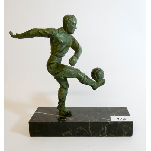 472 - An Art Deco Verdigris patinated spelter figure of a vintage footballer on a marble base, base measur... 