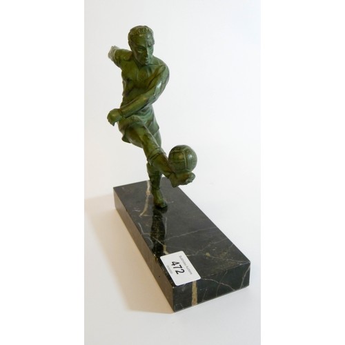 472 - An Art Deco Verdigris patinated spelter figure of a vintage footballer on a marble base, base measur... 