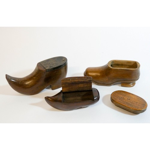 474 - A collection of three antique carved treen snuff shoes