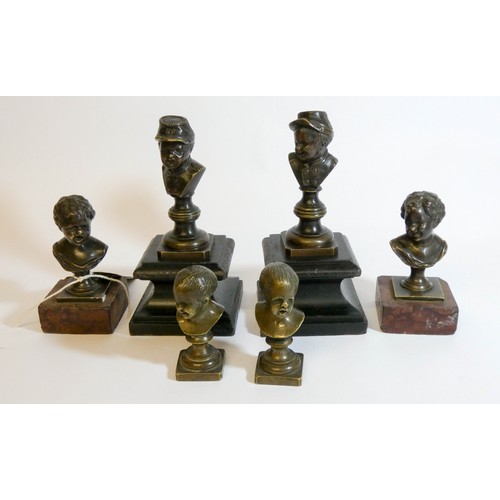 477 - Three pairs of 19th century bronze mounted bust desk paperweights depicting children, tallest measur... 