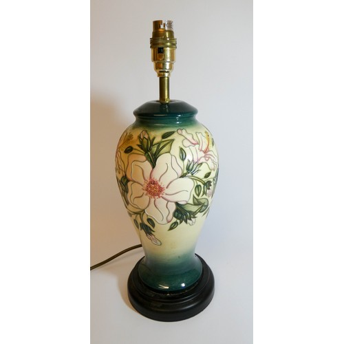 484 - A large modern Moorcroft lamp base decorated with dog roses with shade, height to top of lamp fittin... 