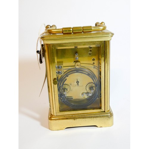 577 - A French gilt brass striking carriage clock with key, white enamel dial signed Maigret Paris, height... 