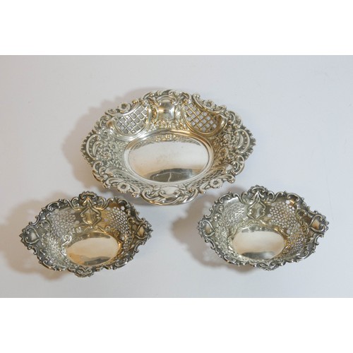 451 - Oval pierced hallmark silver bon bon dish and a pair of smaller oval bon bon dishes 4.6 troy ozs