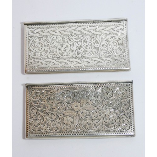 455 - Two very similar hallmark silver envelope card cases with engraved decoration, each measuring 8cms a... 