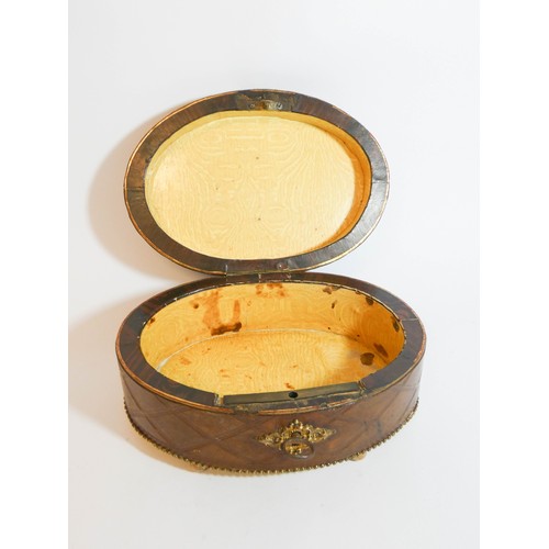 461 - An antique oval leather and mother of pearl inlaid gilt metal mounted jewellery casket measuring 18c... 