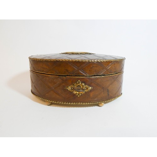 461 - An antique oval leather and mother of pearl inlaid gilt metal mounted jewellery casket measuring 18c... 