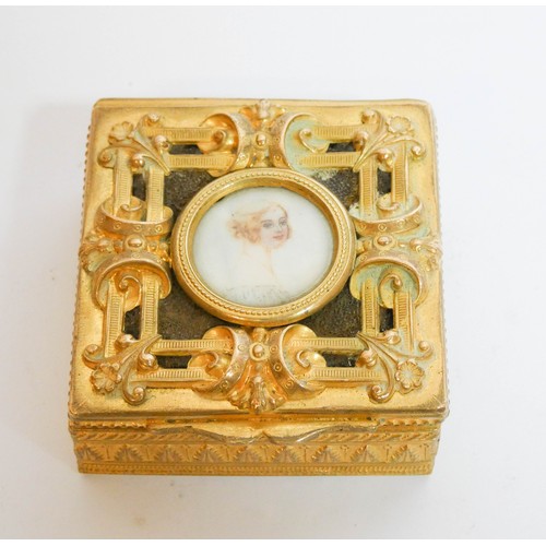 462 - French gilt metal square trinket box, the openwork lid inset with a watercolour miniature painting o... 