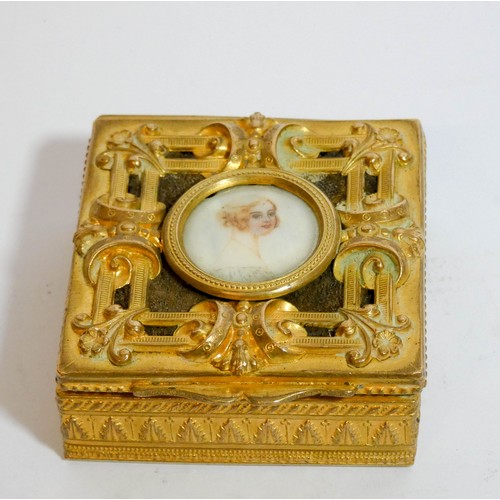 462 - French gilt metal square trinket box, the openwork lid inset with a watercolour miniature painting o... 