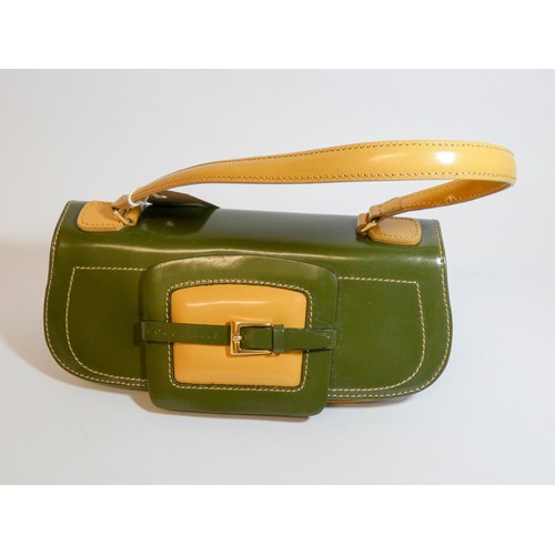 463 - 1970's vintage coccinelle green and mustard leather saddle style handbag