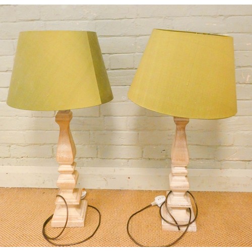 295 - A pair of modern turned wooden limed finish table lamps with lime green silk shades