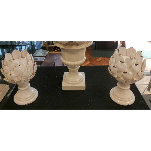 297 - A pair of crackle finish artichoke candle holders