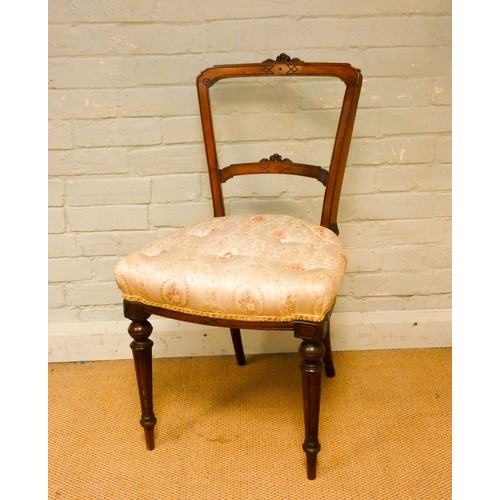 803 - A Victorian balloon back occasional chair with a buttoned floral silk seat