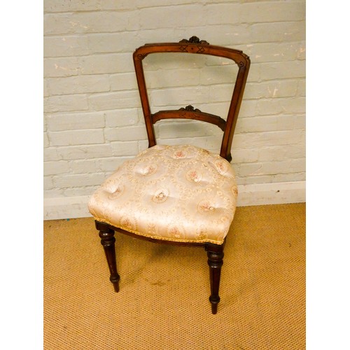 803 - A Victorian balloon back occasional chair with a buttoned floral silk seat