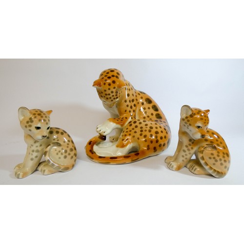 445 - Russian porcelain figure of a Leopard with two cubs marked in puce underneath