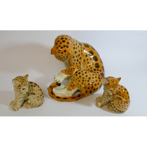 445 - Russian porcelain figure of a Leopard with two cubs marked in puce underneath