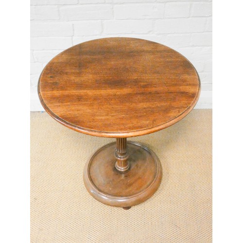 805 - A circular Victorian mahogany occasional table on a reeded column base