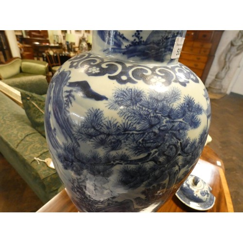 505 - A 19th century Chinese blue and white vase and cover decorated with figures on horseback, the lid wi... 