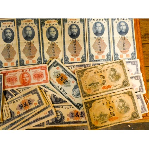 572 - A very large accumulation of foreign bank notes, mostly Chinese issue together with Japanese war tim... 