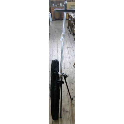 105 - An artists adjustable chrome easel with carrying bag