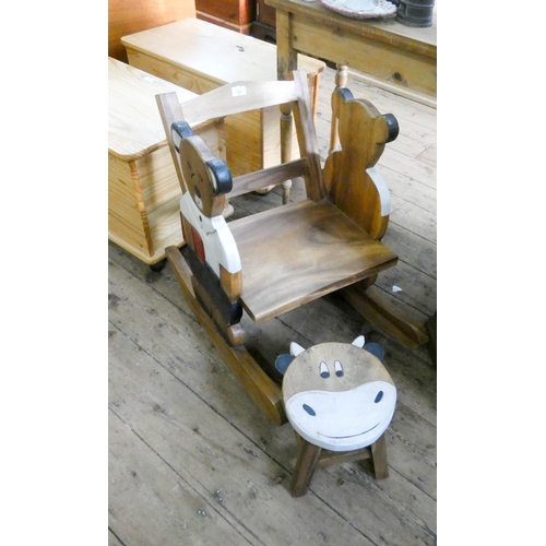 107 - A child's wooden teddy bear painter chair with matching stool