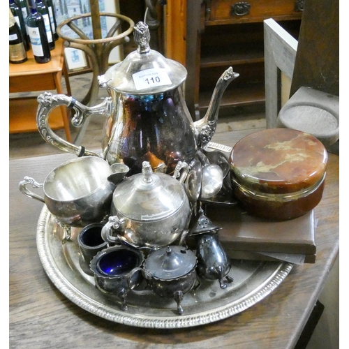 110 - Three piece plated tea set, plated tray, condiments, cutlery etc