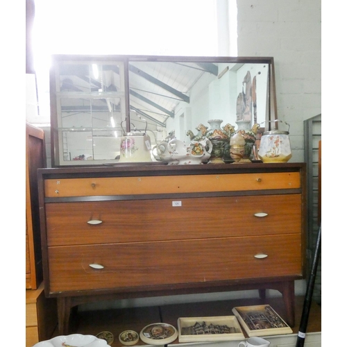 126 - A 1970's teak dressing table, fitted three long drawers, 3'9 wide