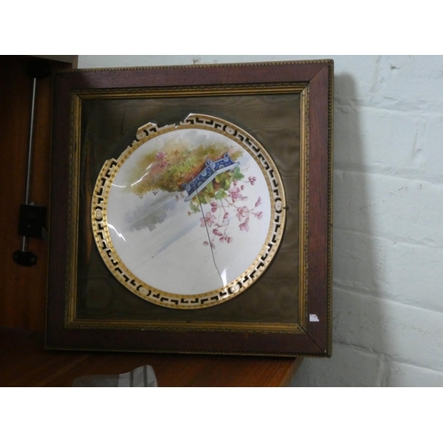 133 - Four framed floral decorated plaques, one damaged