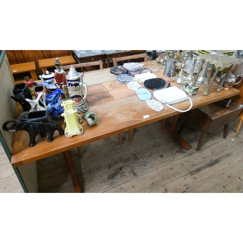 136 - A 1970's teak refectory style dining table with tiled inset top